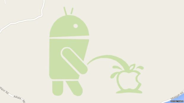 Android mascot urinating on an Apple logo